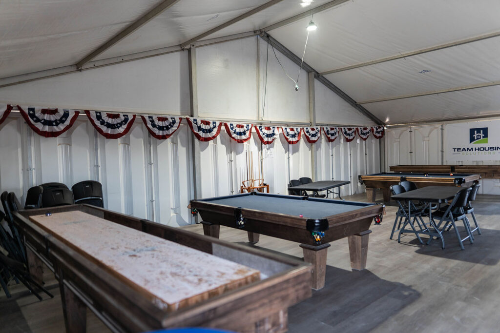 Billiards and Shuffleboard Tables In A Recreational Area